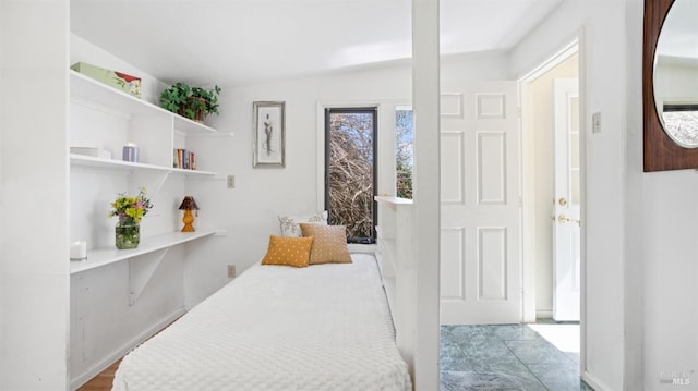 bedroom with vaulted ceiling