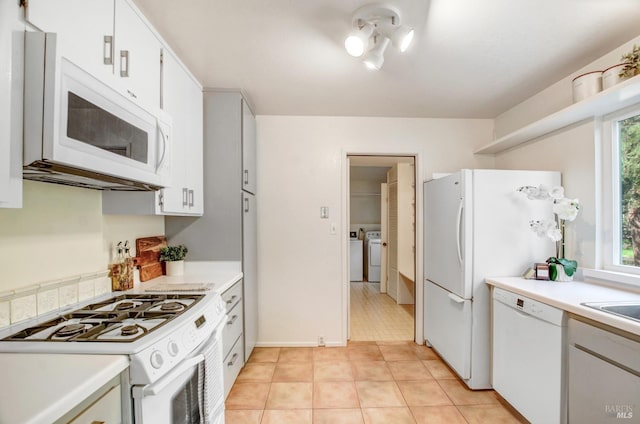 361 Neva St, Sebastopol, CA 95472 - kitchen with white appliances, light countertops, light tile patterned floors, and washer and dryer