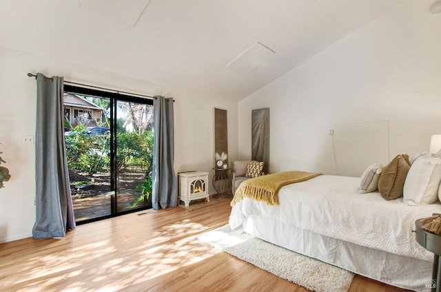 361 Neva St, Sebastopol, CA 95472 - bedroom featuring access to exterior, visible vents, lofted ceiling, and wood finished floors