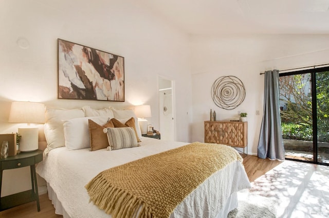 361 Neva St, Sebastopol, CA 95472 - bedroom with access to exterior, lofted ceiling, and wood finished floors