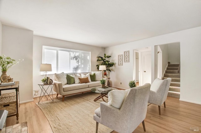 361 Neva St, Sebastopol, CA 95472 - living room featuring light wood-style floors, stairs, and baseboards