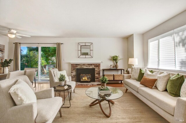 361 Neva St, Sebastopol, CA 95472 - living room with a fireplace, ceiling fan, and wood finished floors