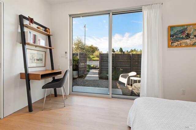 505 Dusty Ln, Sebastopol, CA 95472 - bedroom with access to exterior and wood finished floors