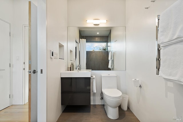 505 Dusty Ln, Sebastopol, CA 95472 - full bathroom featuring vanity, a shower, and wood finished floors