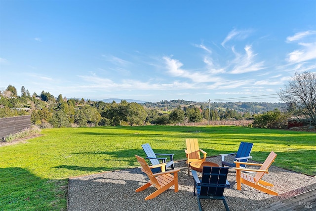 505 Dusty Ln, Sebastopol, CA 95472 - view of green lawn with an outdoor fire pit and a mountain view