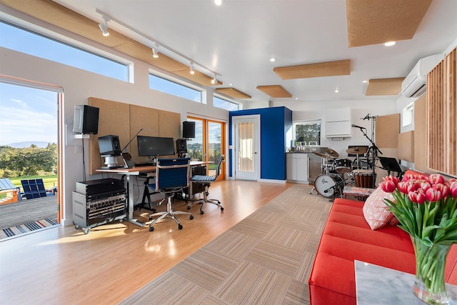 505 Dusty Ln, Sebastopol, CA 95472 - office area featuring light wood-style floors, a wall unit AC, and rail lighting