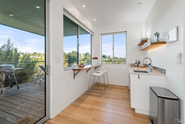 505 Dusty Ln, Sebastopol, CA 95472 - kitchen featuring open shelves, light wood-type flooring, light countertops, white cabinetry, and recessed lighting