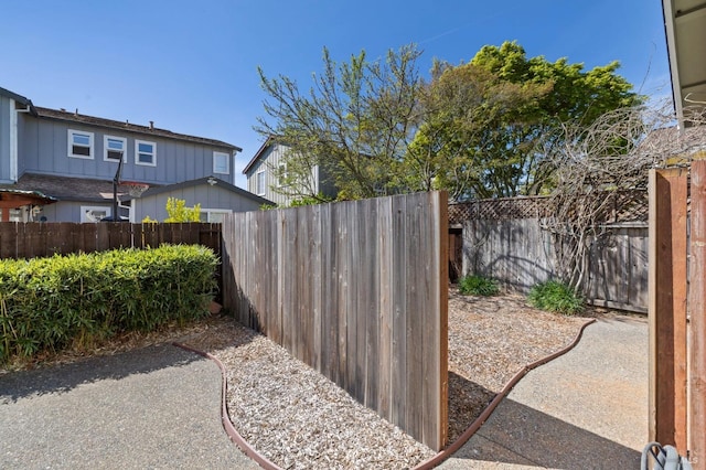view of yard with a fenced backyard