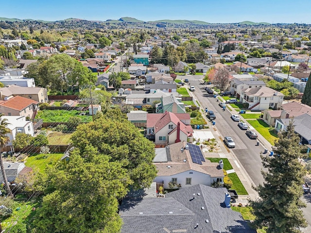 drone / aerial view featuring a mountain view and a residential view