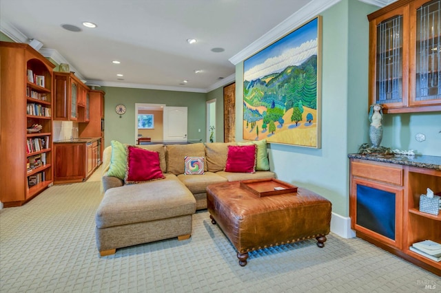 living room with ornamental molding, baseboards, light colored carpet, and recessed lighting