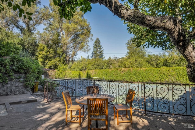 view of patio with outdoor dining area