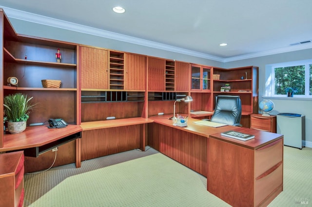 carpeted home office with built in desk, visible vents, crown molding, and recessed lighting