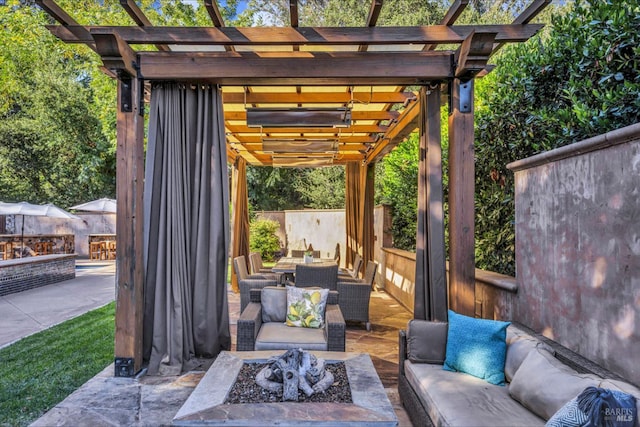 view of patio / terrace featuring a pergola, fence, and an outdoor living space with a fire pit