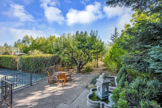 view of patio featuring outdoor dining space