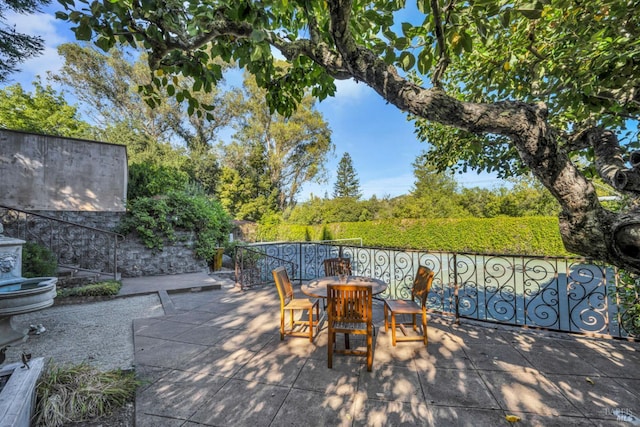 view of patio with outdoor dining area
