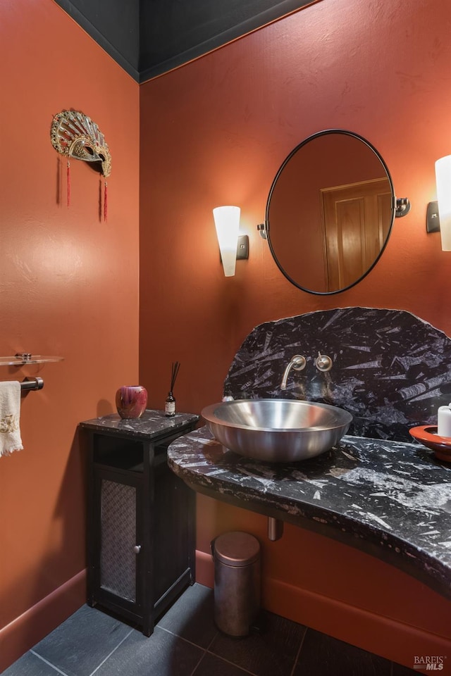 bathroom featuring a sink and tile patterned floors