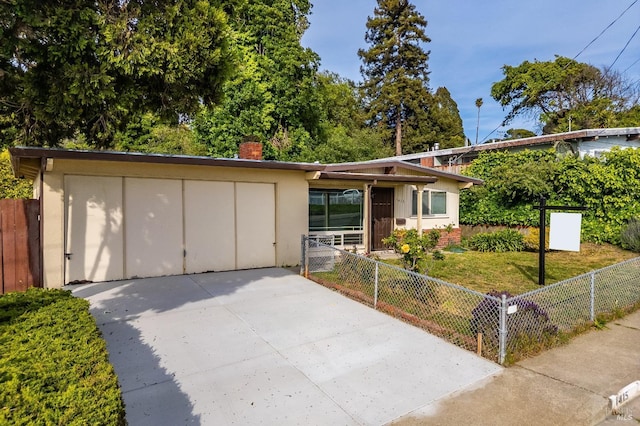 ranch-style house with fence and a chimney
