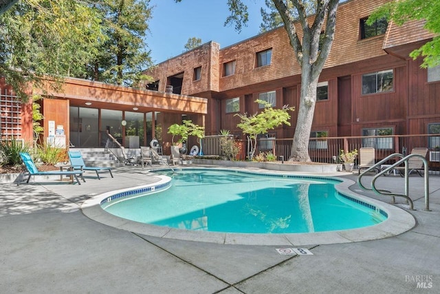pool with a patio