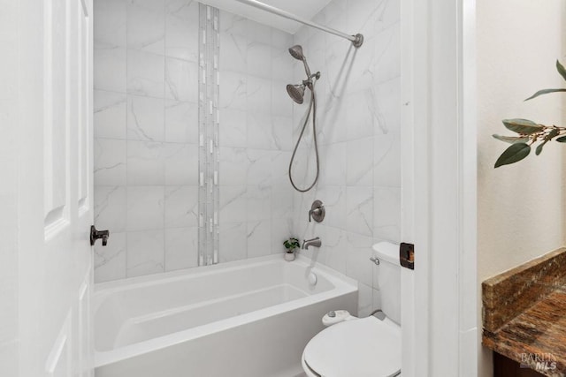 full bathroom featuring toilet and shower / bathtub combination