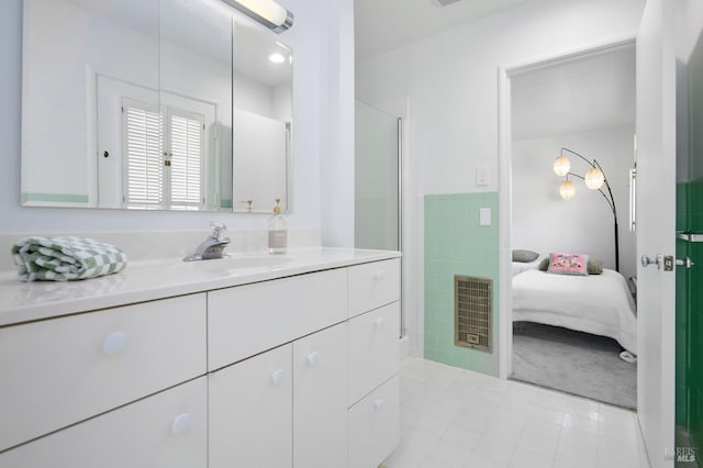 2 Beach Rd, Belvedere, CA 94920 - bathroom with tile patterned flooring, vanity, and an enclosed shower