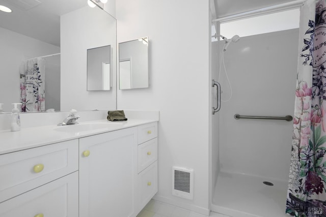 2 Beach Rd, Belvedere, CA 94920 - bathroom with a shower with curtain, vanity, and tile patterned flooring