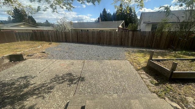 175 Nehoc Ct, Ukiah, CA 95482 - view of yard featuring a garden, a fenced backyard, and a patio