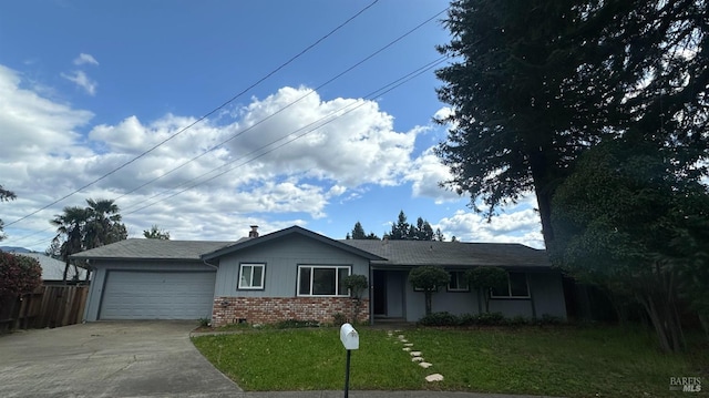 175 Nehoc Ct, Ukiah, CA 95482 - ranch-style house featuring fence, a garage, concrete driveway, a front yard, and brick siding