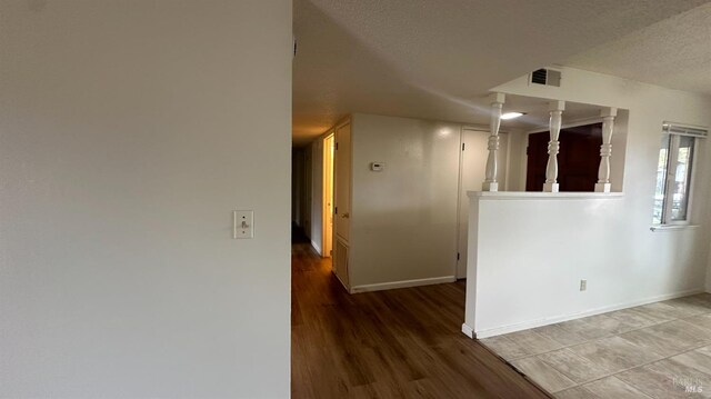 175 Nehoc Ct, Ukiah, CA 95482 - empty room featuring baseboards, visible vents, light wood-type flooring, and a textured ceiling