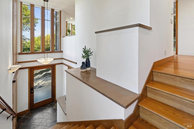 45 Bella Vista Ave, Belvedere, CA 94920 - foyer entrance with baseboards, stairway, and stone tile flooring