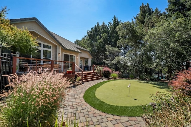 view of yard featuring a deck