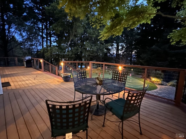 deck featuring outdoor dining space