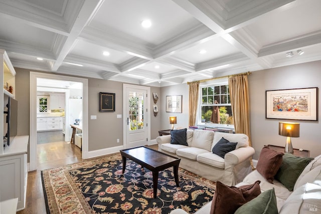 living room with beam ceiling, coffered ceiling, recessed lighting, and wood finished floors