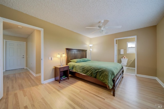 bedroom with baseboards, a textured ceiling, ceiling fan, and light wood finished floors