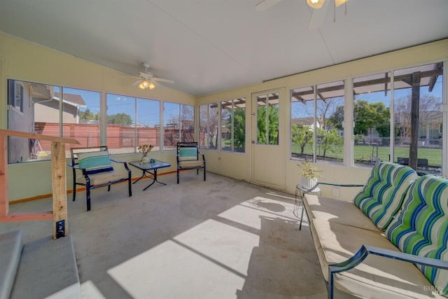 sunroom / solarium featuring an outdoor hangout area and a ceiling fan