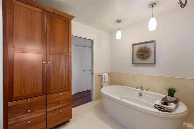 bathroom with a tub to relax in, a stall shower, and tile walls