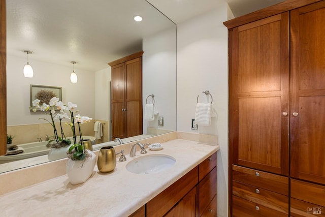 bathroom featuring tile walls and a freestanding tub