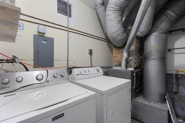 garage featuring a garage door opener and washer / clothes dryer