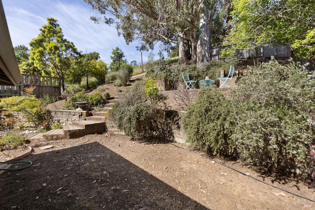 view of yard featuring fence