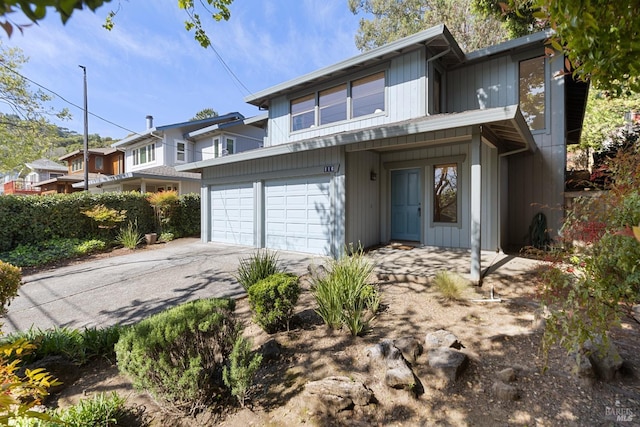 view of front of house with driveway and an attached garage