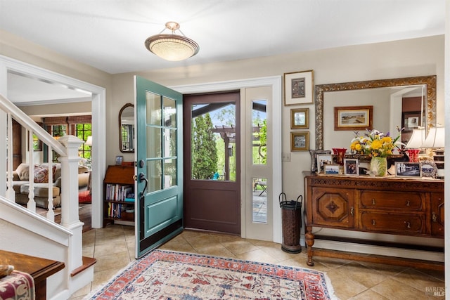 foyer with light tile patterned floors