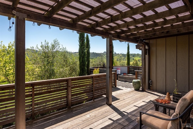 wooden terrace with a pergola