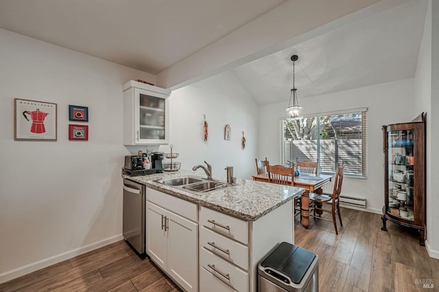 6482 Meadow Pines Ave, Rohnert Park, CA 94928 - kitchen featuring white cabinetry, a sink, a peninsula, and stainless steel dishwasher