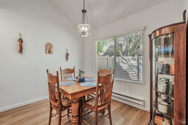 6482 Meadow Pines Ave, Rohnert Park, CA 94928 - dining room with baseboards, lofted ceiling, and light wood-style floors