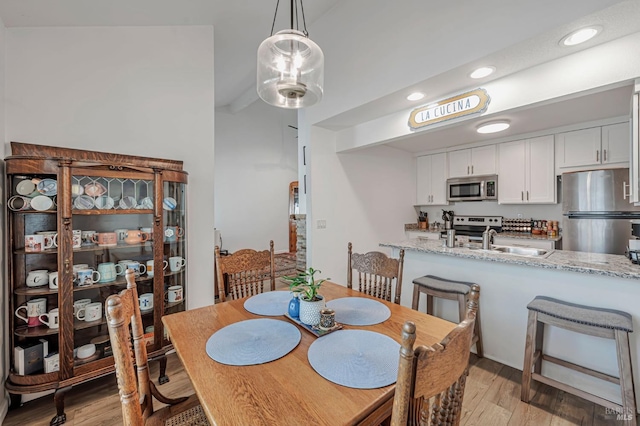 6482 Meadow Pines Ave, Rohnert Park, CA 94928 - dining room with light wood finished floors and recessed lighting