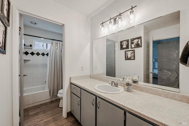 6482 Meadow Pines Ave, Rohnert Park, CA 94928 - full bathroom featuring wood finished floors, toilet, shower / tub combo with curtain, and vanity