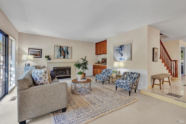 271 Antigua Way, Vallejo, CA 94591 - living room featuring light carpet, a tiled fireplace, and stairs