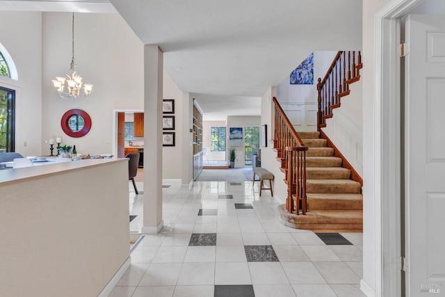 271 Antigua Way, Vallejo, CA 94591 - foyer featuring a chandelier, stairs, light tile patterned flooring, and baseboards