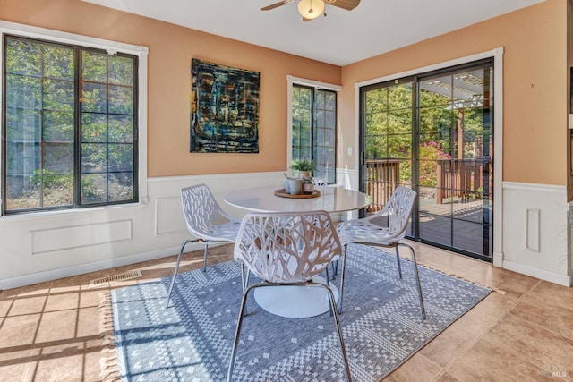 271 Antigua Way, Vallejo, CA 94591 - dining space with a wainscoted wall, ceiling fan, and a decorative wall