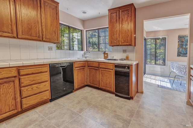 271 Antigua Way, Vallejo, CA 94591 - kitchen featuring black dishwasher, brown cabinets, and healthy amount of natural light