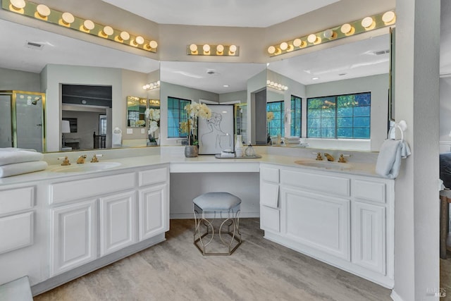 271 Antigua Way, Vallejo, CA 94591 - bathroom with wood finished floors, double vanity, and a stall shower